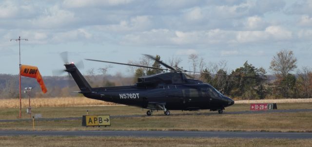 Sikorsky S-76 (N576DT) - Taxiing for departure is this 2001 Sikorsky S-76C+ Rotorcraft in the Autumn of 2024.