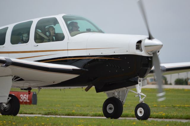 Beechcraft 35 Bonanza (N5EH) - Arriving early to Oshkosh 2013.