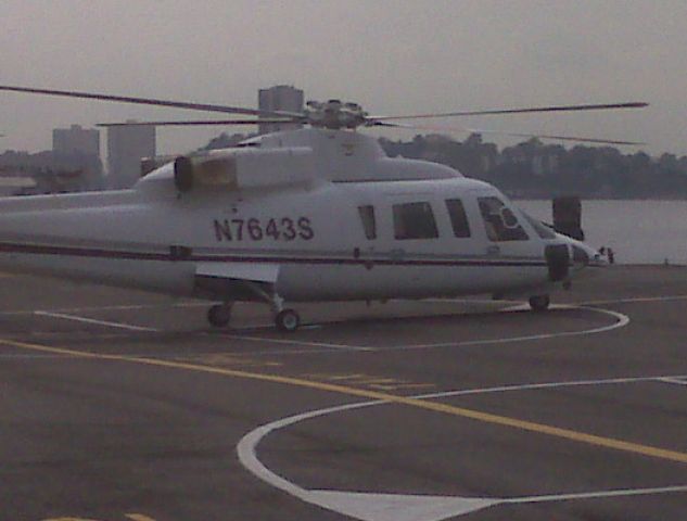 Sikorsky S-76 (N7643S) - At Manattans East 30th Street heliport Sept. 13 2008. Picture taken with Blackberry 8310.