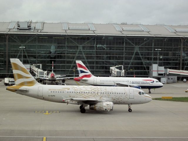 Airbus A319 (G-EUPD) - "Golden Feathers" livery