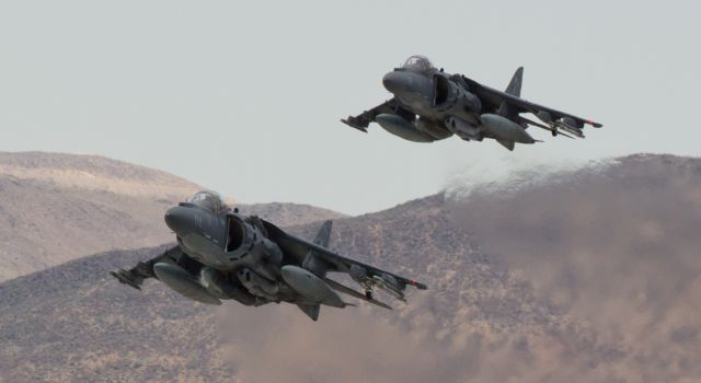 Boeing Harrier (16-4571) - Two VMA-311 "Tomcats" come up and away from Renos infrequently used runway 25.  The lead (lower) AV-8B Harrier ("01") is 164571, but I was unable to catch the numbers on the second one.  Both were heading back to their MCAS Yuma home base after making an Armed Forces Day stopover in Reno.