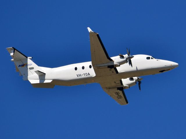 Beechcraft 1900 (VH-YOA) - Getting airborne off runway 23 on a beautiful Adelaide autumn day. Thursday 12th April 2012.