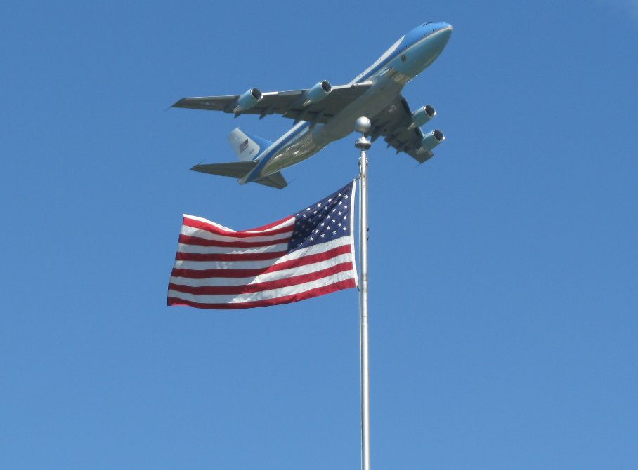 N28000 — - Air Force One taking off from Albany NY 21 Sept 2009.  Unretouched photo: I just happened to frame the flag and plane as you see it