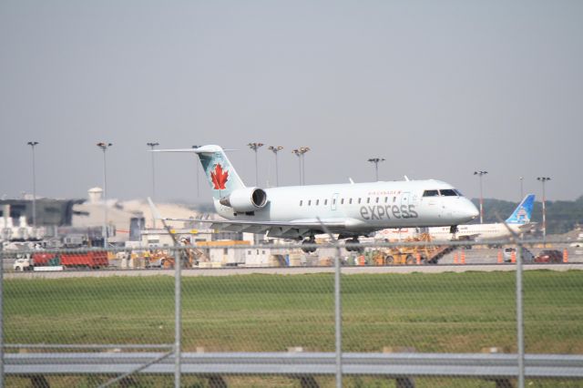 Canadair Regional Jet CRJ-200 (C-GNJA) - Arriving from Boston on runway 06R