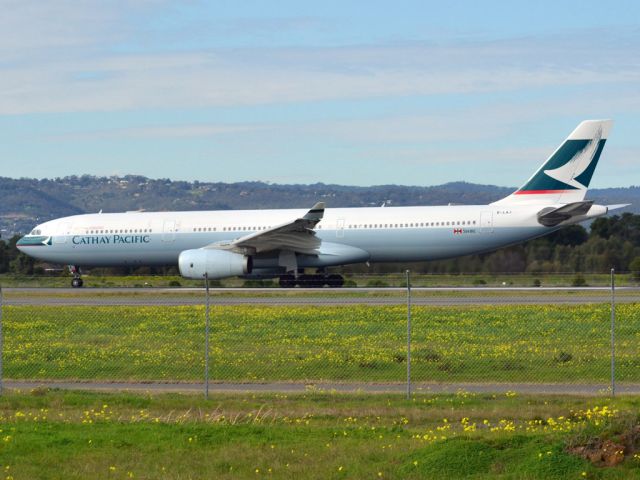 Airbus A330-300 (B-LAJ) - Rolling for take off on runway 05, for flight home to Hong Kong via Melbourne. Thursday 12th July 2012.