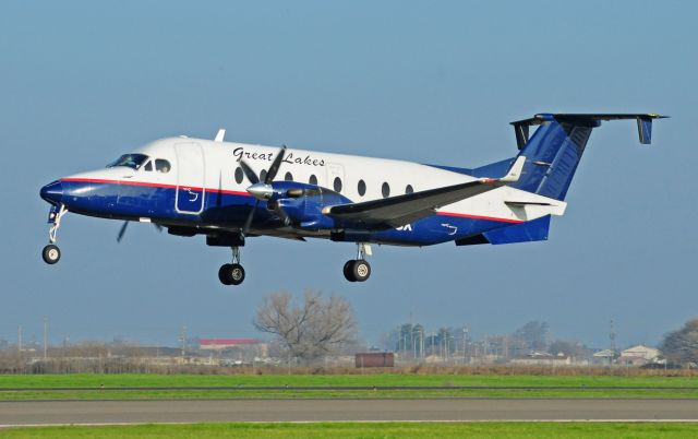 Beechcraft 1900 (N122UX) - Lakes 197 landing runway three-zero, Merced Regional Airport.