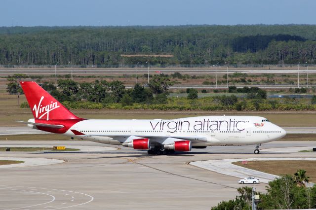 Boeing 747-400 (G-VAST) - Virgin Atlantic Airways (VS) G-VAST B747-41R [cn28757] br /Orlando (MCO). Taxis to the gate after just arriving from London Gatwick (LGW) Virgin Atlantic flight VS15.br /Taken from MCO Terminal Top Parking Garagebr /2017 05 15  a rel=nofollow href=http://alphayankee.smugmug.com/Airlines-and-Airliners-Portfolio/Airlines/EuropeanAirlineshttps://alphayankee.smugmug.com/Airlines-and-Airliners-Portfolio/Airlines/EuropeanAirlines/a