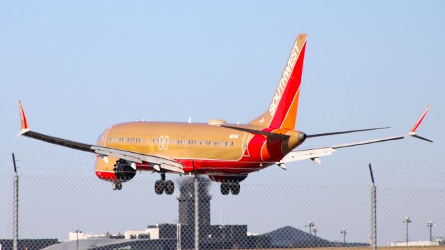 Boeing 737 MAX 8 (N871HK) - The Herbert D. Kelleher Desert Gold retro aircraft beginning its flare on arrival from LAS as WN933