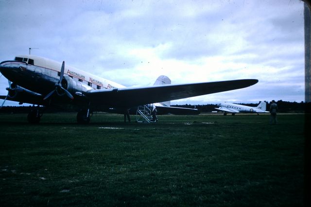 Douglas DC-3 (VH-ABR) - ANA DC3 VH-ABR at Flinders Island, RAAF C47 behind, circa 1958