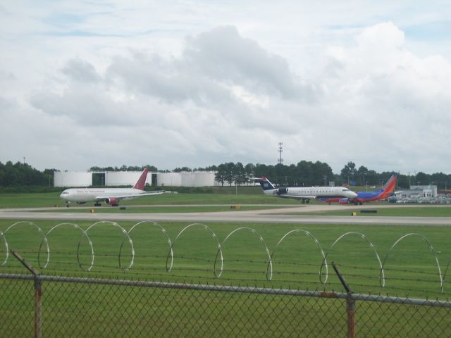 — — - SPOTTING AT CLT