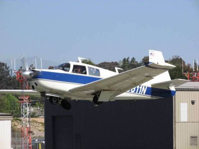 Mooney M-20 (N6811N) - Taking off from RWY 24