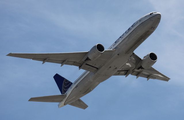 Boeing 777-200 (N798UA) - Departure off of 28L to TPE  07-11-2015