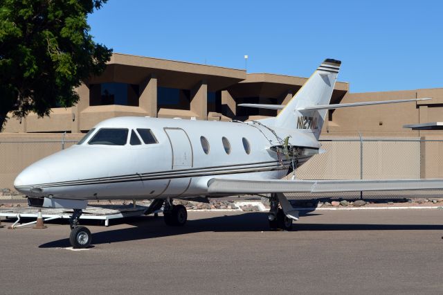 Dassault Falcon 10 (N127WL) - Poor little Falcon 10...