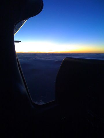 Cessna Skylane — - flying at 10,000 feet over the smokey mouantains right at sunset took off with 400 foot celings and climbed out over them to see this beautiful sight flying home from the orange bowl