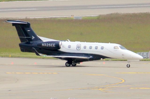 Embraer Phenom 300 (N326EE) - Taxiing to the EBACE ramp on 26-May-24 arriving from EGSS.