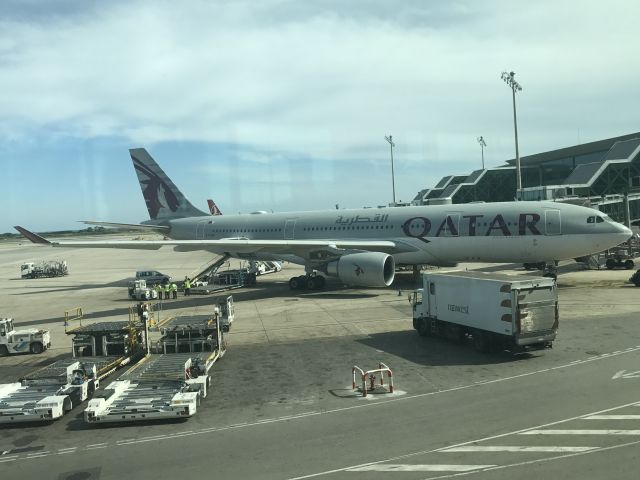 Airbus A330-300 (A7-ACH) - Just landed in Barcelona and heading to the exit when I saw this plane parked.