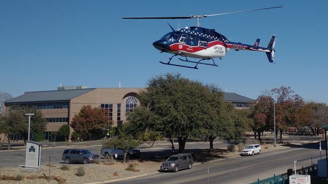 Bell JetRanger (N464AE) - Take off from Shannon Medical Center, San Angelo, Texas. 