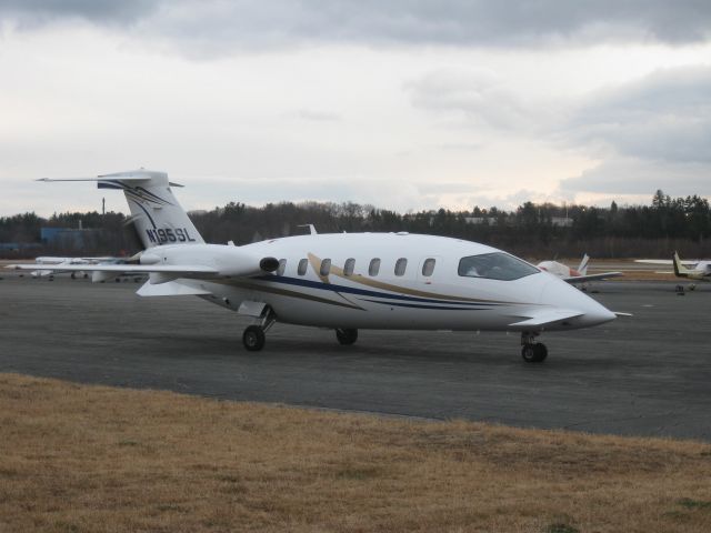 Piaggio P.180 Avanti (VNR195) - Parking on the ramp after arriving from Marquette, MI (KSAW).