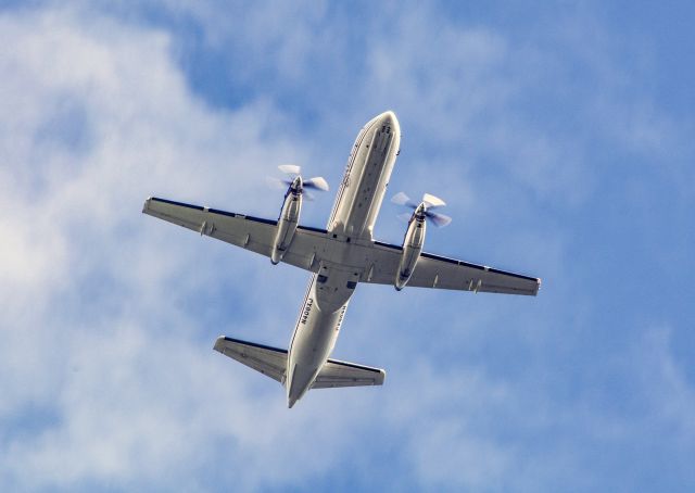 Saab 340 (N406XJ) - PenAir Saab 340 approach to Boston over the harbor.