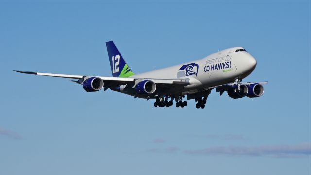 BOEING 747-8 (N770BA) - BOE12 on final to Rwy 16R after a flyover of the Seahawks Victory Celebration on 2/5/14. (LN:1437 cn 37564).