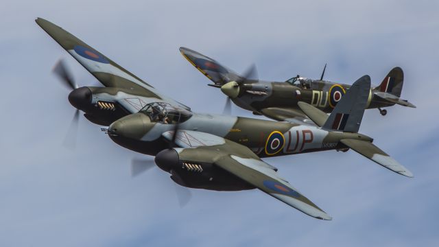 — — - de Havilland D.H.98 Mosquito T.Mk.III followed by Supermarine Spitfire Mk.Vcbr /Paine Field, Everett, Washington, July 21, 2018