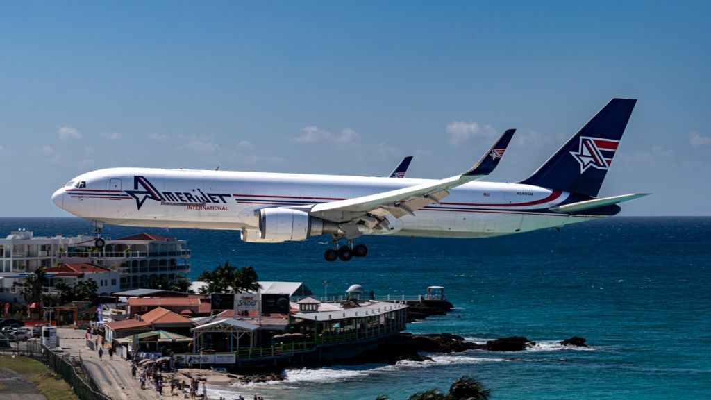 BOEING 767-300 (N349CM) - Amerijet B763 flying over Maho Beach while about to land at TNCM.