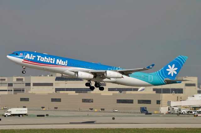 Airbus A340-300 (F-OSEA) - An Air Tahiti Nui Airbus A-340 on take off @ LAX.