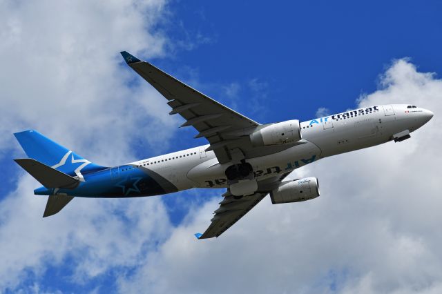 Airbus A330-200 (C-GUBF) - Air Transat Airbus A330 departing YYC on July 1.