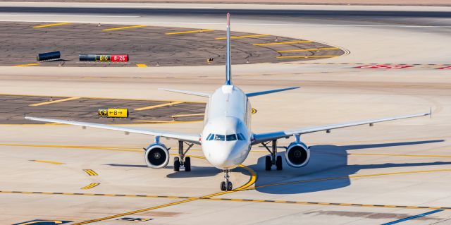 Airbus A321 (N578UW) - An American Airlines A321 in US Airways retro livery taxiing at PHX on 2/4/23. Taken with a Canon R7 and Tamron 70-200 G2 lens.