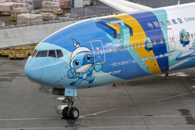 BOEING 777-300ER (B-2007) - 1st February, 2024: "WorldSkill 2022" livery China Southern T7 parked on the apron at SFO. 