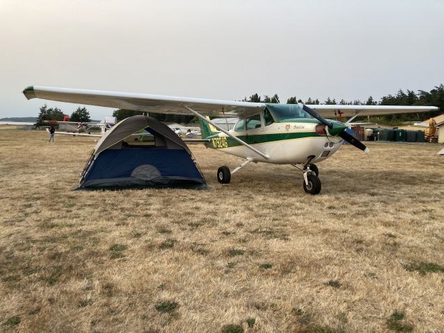 N7924G — - Tent camping under the wing on Orcas Island.