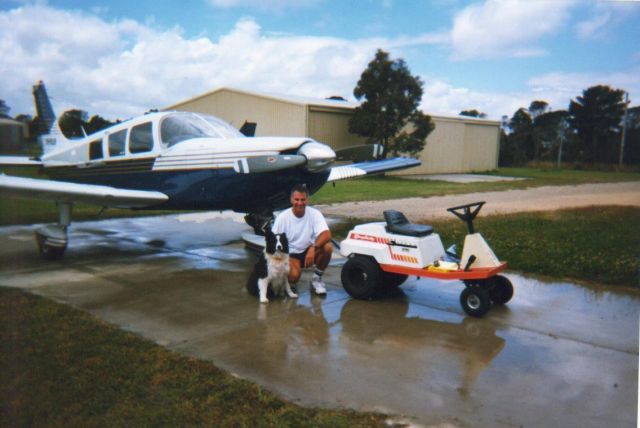 Piper Saratoga (VH-RUB) - Tyabb Victoria, around 1990, with Gypsy my Border Collie, a keen flyer