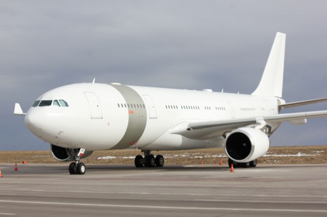 Airbus A330-300 (A7-HHM) - Parked at DIA/Signature.