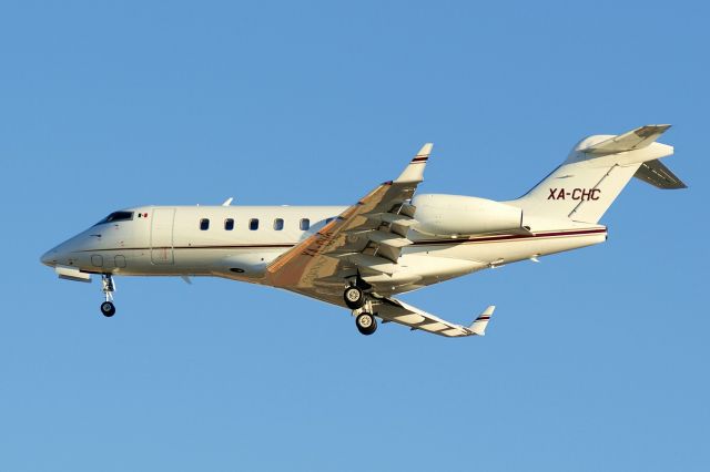 Bombardier Challenger 300 (XA-CHC) - 4 arrival at sunset.