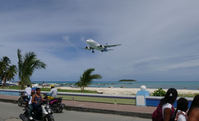 Airbus A318 (CC-COZ) - Airplanes landing on Rwy 24 offer a great opportunity for spotting and photographing similar to Princess Juliana airport of St. Maarten.