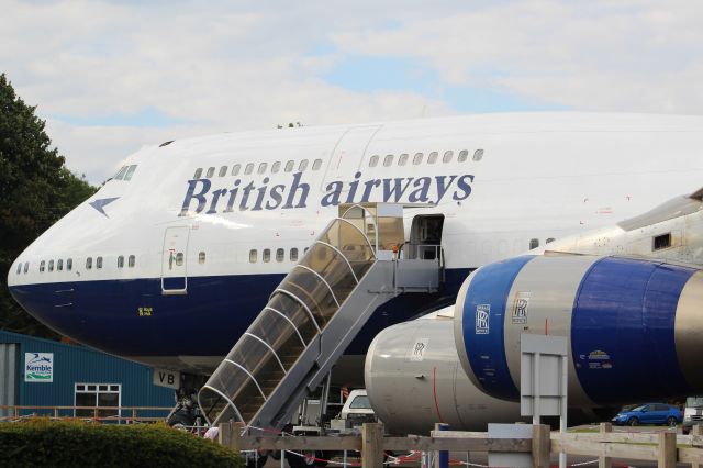 Boeing 747-400 (G-CIVB) - G-CIVB, A perserved BA B747-400 parked at Cotswold Kemble airport. It is wearing the first BA livery after BOAC and BEA merged in 1974, the livery being the 'Negus' livery. It was worn until 1978 when the Landor Livery was introduced.br /br /You are able to see the aircraft, and tour the plane at Cotswolt Kemble Airport, located in the county, Gloucestershire, England. Touring is avaliable once every 2 weeks, on a Wednesday.br /br /Location: Cotswold Kemble Airport.br /Date: 31.08.22 (dd/mm/yy).