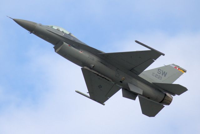 00221 — - This Lockheed Marting F-16CJ-50 provided a blazing flight demonstration at EAA AirVenture 2018 by constantly blasting down the show line at 500 kts.  The pilot appeased the photographers with on high-angle slow pass.