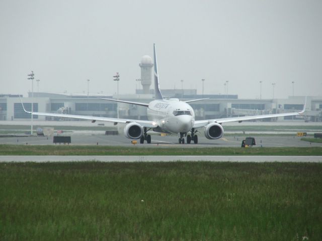 Boeing 737-700 (C-FWSY) - WJA at runway 05 Line up and wait...