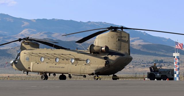 Boeing CH-47 Chinook (0408709) - Under tow to the south end of the airport.