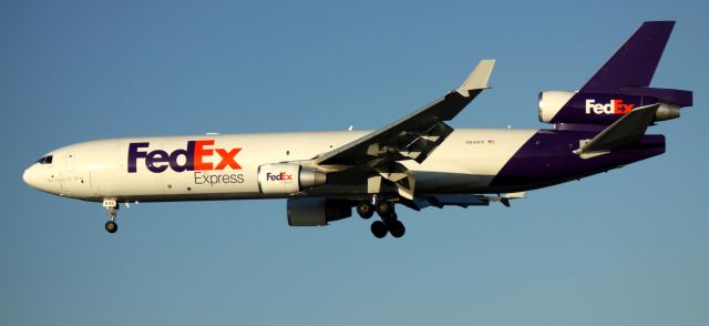 Boeing MD-11 (N645FE) - Landing 30L