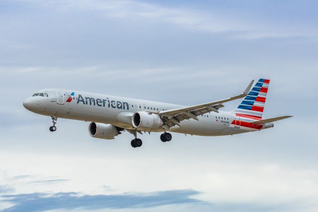 Airbus A321neo (N436AN) - An American Airlines A321 neo landing at PHX on 3/11/23. Taken with a Canon R7 and Canon 100-400 EF L II lens.