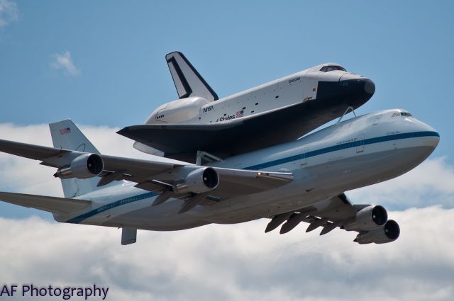 Boeing 747-200 (N905NA) - Space Shuttle Enterprise (OV-101) arrives in New York, NY at John F. Kennedy International Airport atop the modified NASA Boeing 747-100.  The Enterprise will become the cornerstone exhibit at the USS Intrepid Air, Sea, and Space Museum on the Hudson River in Manhattan.