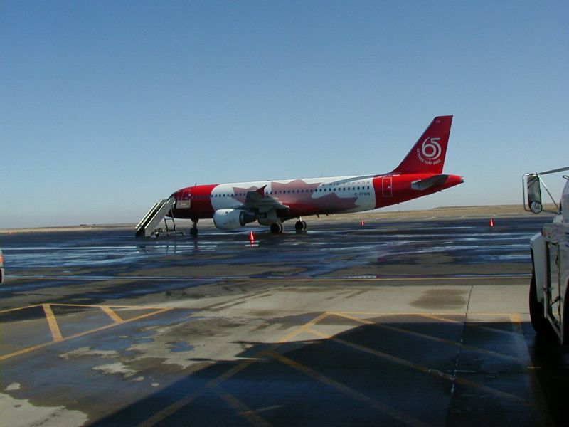 Airbus A319 (C-FFWN) - Air Canada 65th Anniversary Bird in 2002 on a NHL Hockey Charter