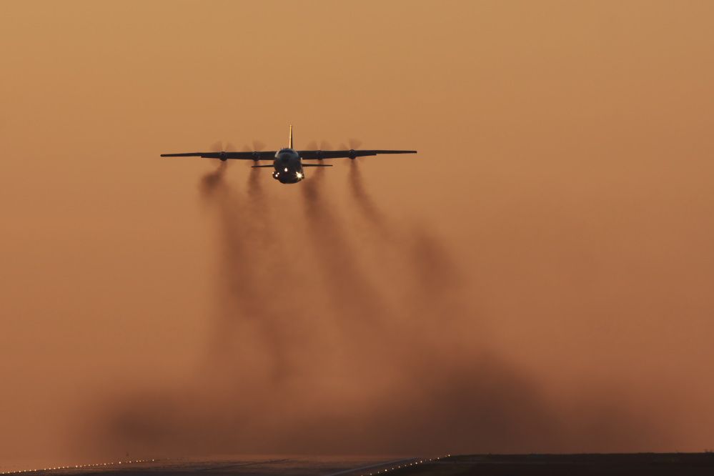Antonov An-12 (UR-DWI) - take off befor sunrise...Antonov AN12, RWY26L EDDP