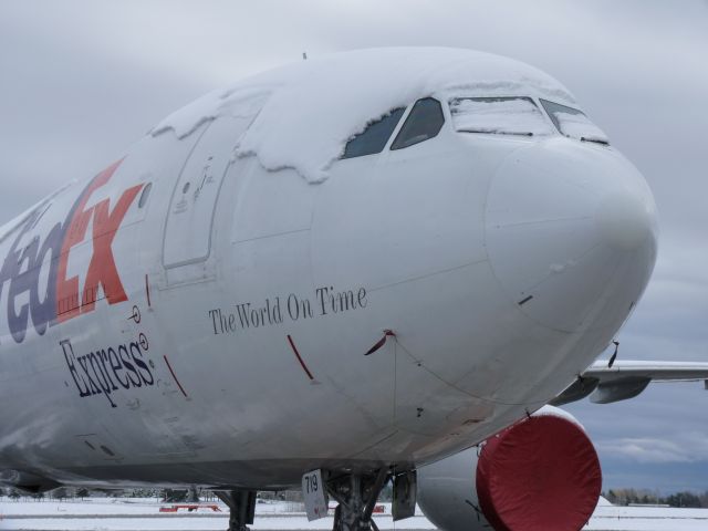 Airbus A310 — - the effects of Ottawas first snowfall, on a plane.