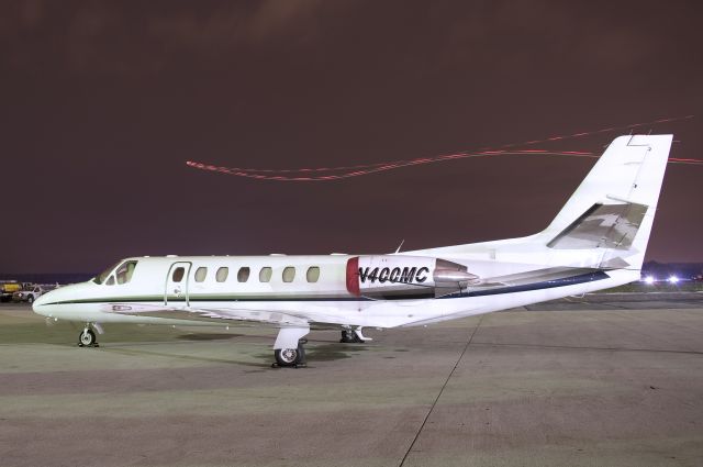 Cessna Citation V (N400MC) - Seen at KFDK on 5/2/2011.  N1054S flies in the background.