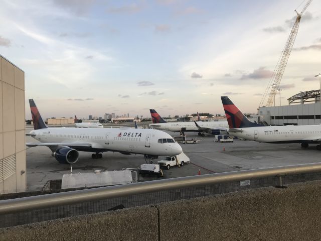Boeing 737-700 (N807DN) - Early AM Delta aircraft parking with an A321 taxiing in the background and N807DN at the gate