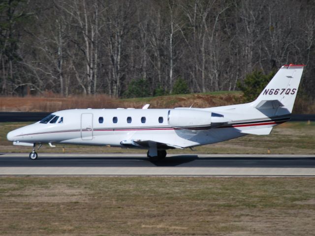 Cessna Citation Excel/XLS (N667QS) - NETJETS INC takeoff roll runway 20 at KJQF - 2/27/13