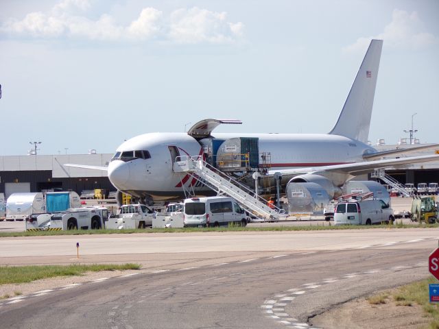 BOEING 767-200 (N797AX) - Looking in the cargo area where N797AX is unloading. I saw it land from a parking garage. I visited on the way out and got this shot.