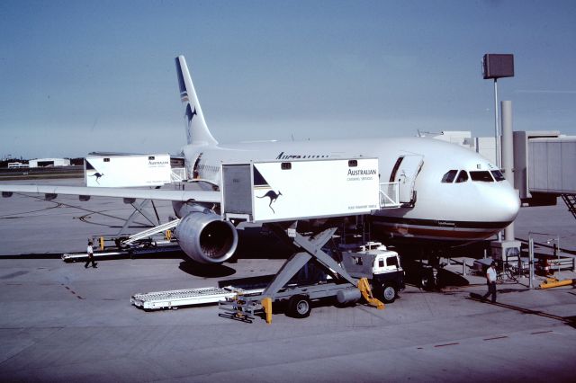 Airbus A300F4-200 (VH-TAE) - Taken at BNE (Brisbane) in 1988.  A300 "John Fawkner".  Waiting for the leg BNE to MEL. Australian Airlines was later taken over by Qantas. 